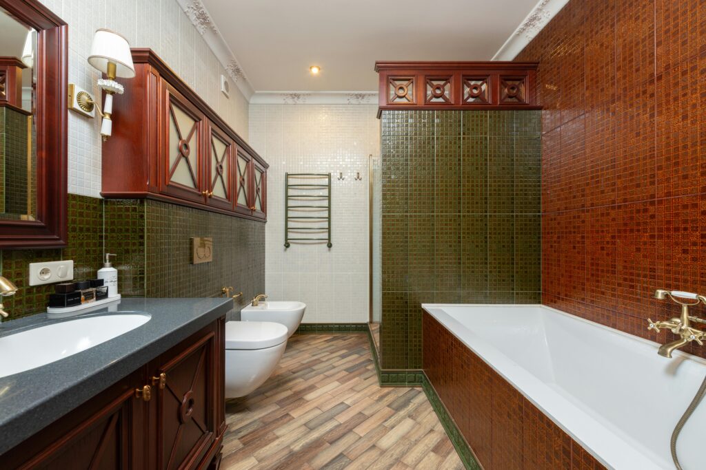 A beautifully designed traditional bathroom featuring luxurious fixtures and classic tiles.